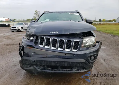 2015 Jeep Compass Sport z USA, uszkodzony, nr VIN 1C4NJDBB0FD130306